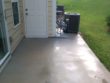 Newnan pressure washing on concrete to clean black stains.