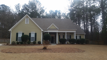 Freshly cleaned shingle roof to remove black streaks on a home in Peachtree City, Ga