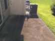 Newnan, Ga patio deck that will need concrete black bacteria & mildew removal.