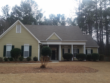 Freshly cleaned shingle roof to remove black streaks on a home in Peachtree City, Ga