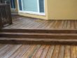 Cleaned deck in Newan, Ga that has been pressure washed to remove grey fibers. Stain has not been applied