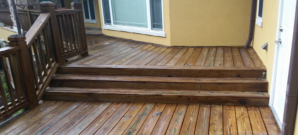 Cleaned deck in Newan, Ga that has been pressure washed to remove grey fibers. Stain has not been applied
