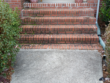 Pressure washing the front steps of a home in Fayetteville, Ga